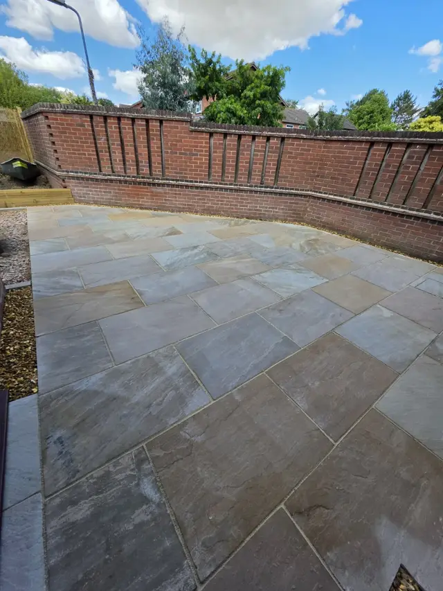 Indian sandstone patio project by The Green Team